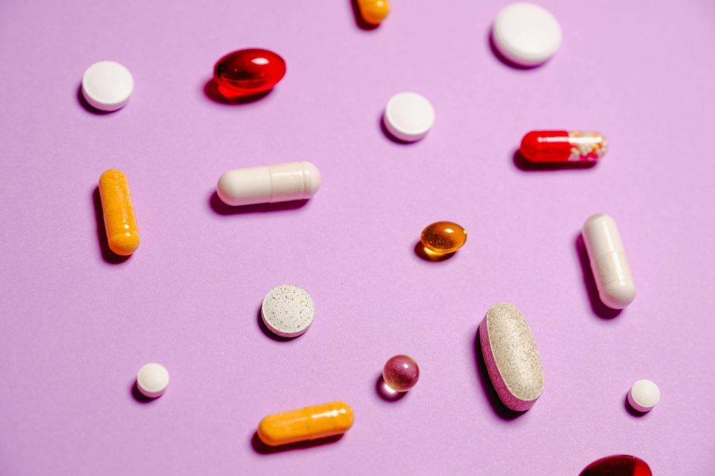 red white and yellow medication pills